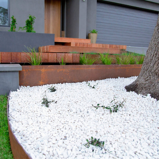 Designing with White Pebbles: Bright Borders and Landscaping Ideas
