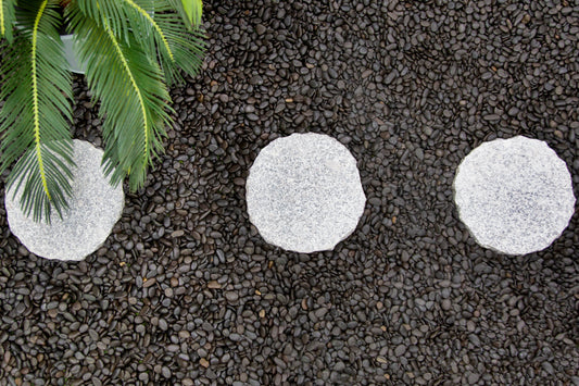 Round Pavers & Pebbles: Creating Organic Garden Paths